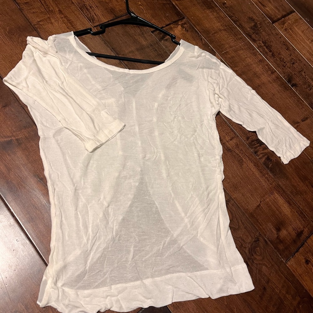 BKE White quarter sleeve shirt with sheer stripe down the back.